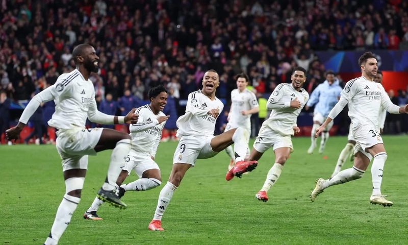 Madrid player celebrates after dramatic penalty shootout victory over Atlético Madrid in the round of 16.