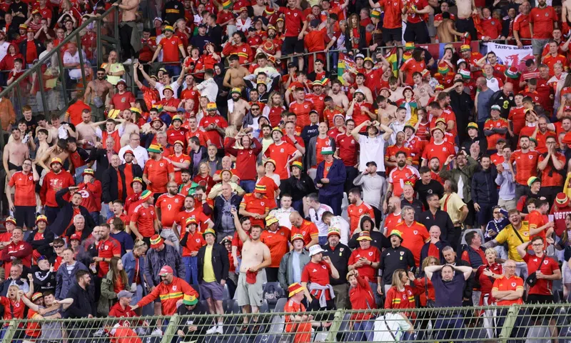 Football fan rushed to hospital after falling from upper stands during wild celebrations