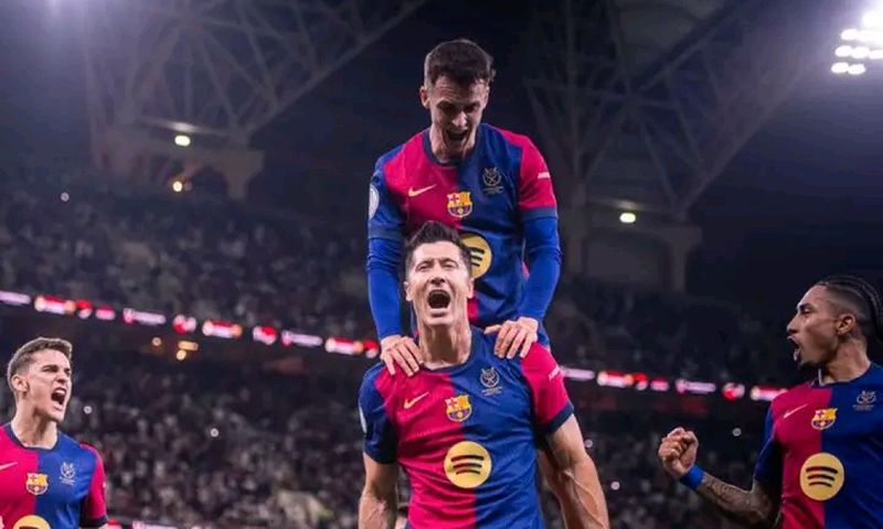 Barcelona players celebrating their goal against Real Madrid in Spanish Super Cup final