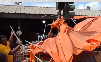 Traders’ canopy under traffic light demolished