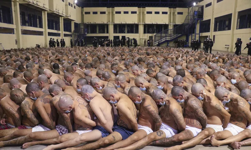 Inmates are lined up during a security operation at the Izalco prison in San Salvador, El Salvador, on April 25, 2020. El Salvador Presidency Press Office / AP