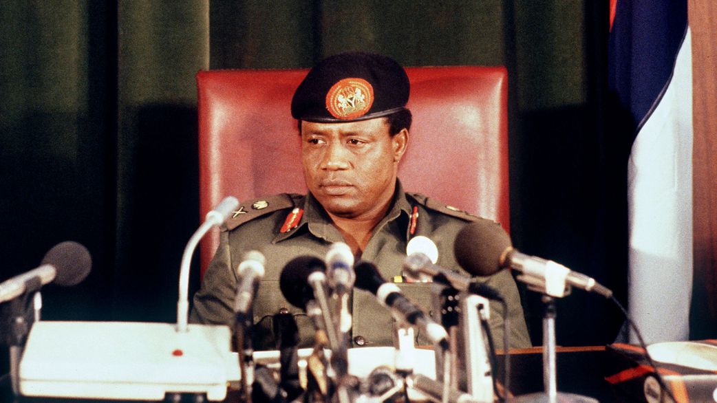 Nigerian leader Ibrahim Babangida takes oath at the government's headquarters in Lagos 02 September 1985. [Francois-Xavier HARISPE/AFP via Getty Images]