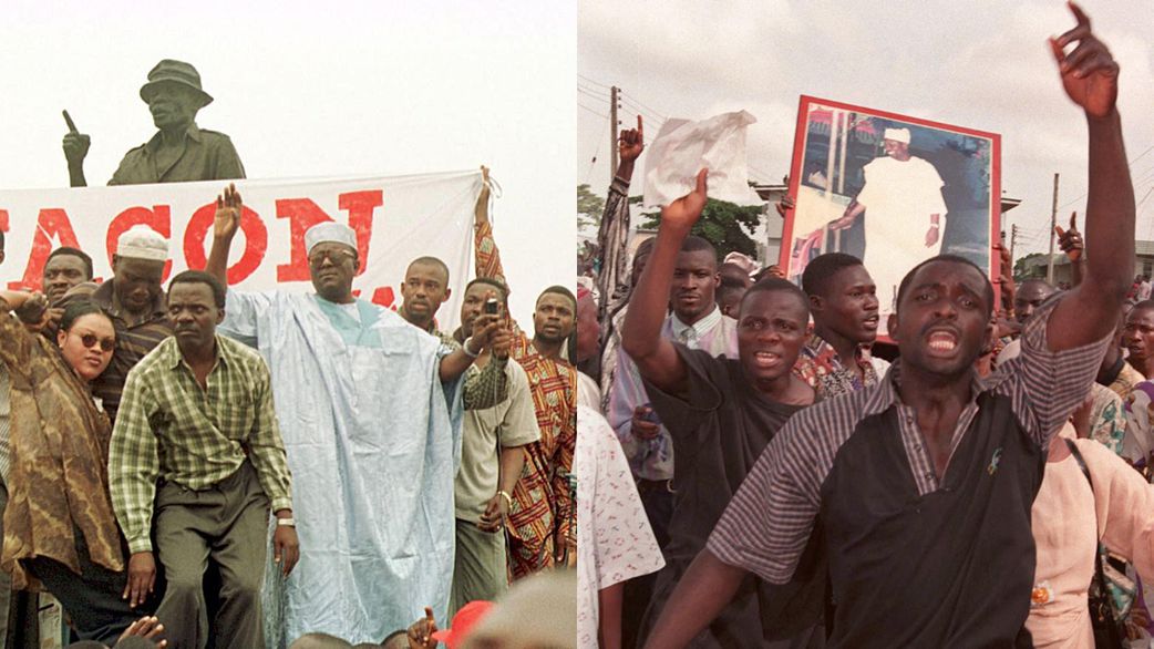 Opposition leader Gani Fawehinmi (R), in blue traditional dress, tries to address protesters gathered at Yaba bus stop for a banned anti-junta demonstration to mark the fifth anniversary of the annulled June 12th 1993 election. [AFP via Getty Images]