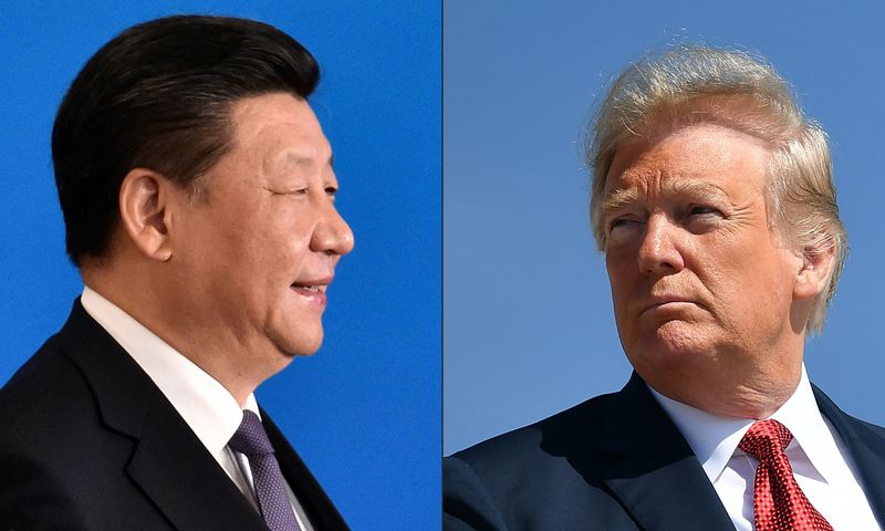 This combination of pictures created on May 14, 2020 shows recent portraits of China's President Xi Jinping (L) and US President Donald Trump. [Getty Images]