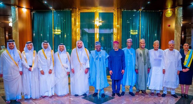 President Bola Tinubu in a group photograph with a delegation from the Amir of the State of Qatar, at the State House, Abuja on May 9, 2025. Credit: State House