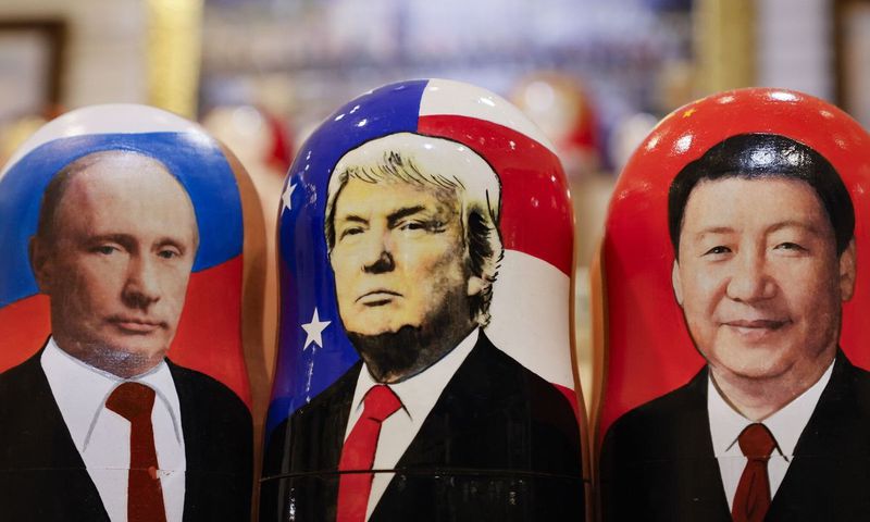 L-R: Russian President Vladimir Putin, US President Donald Trump and China President Xi Jinping
