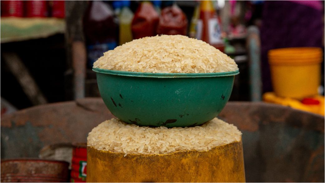 This picture shows a bowl of imported rice at Ajara market, in Badagry, near Lagos, on September 6, 2019. [Getty Images]