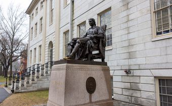 The John Harvard Statue in Harvard Yard during a campus tour on March 17, 2025 in Cambridge, Massachusetts. [Getty Images]