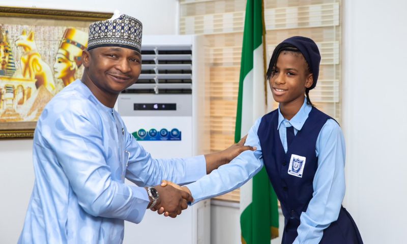 L-R: Hamzat Lawal, founder and outgoing CEO of CODE and 13-year-old Esther Chinemerem Ezeifeka, the new CEO of CODE. [X, formerly Twitter]