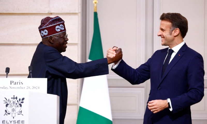 Nigerians react as French President Macron blows pidgin to welcome Tinubu
