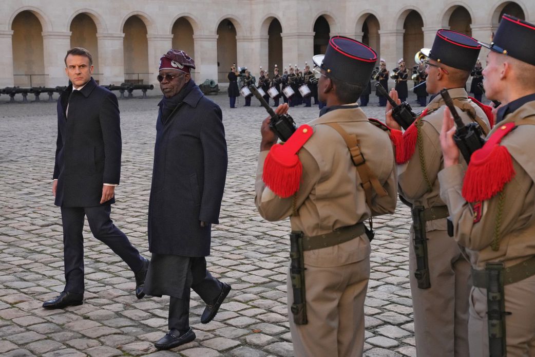 Nigerians react as French President Macron blows pidgin to welcome Tinubu