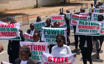 Nigerian legal professionals with placards demanding the immediate restoration of democratic governance in Rivers State. [Facebook]