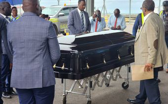 Casket carrying Babu's remains