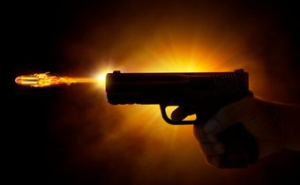 Image of a gun being fired