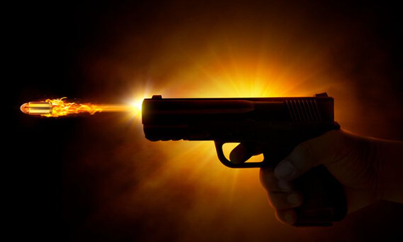 Image of a gun being fired