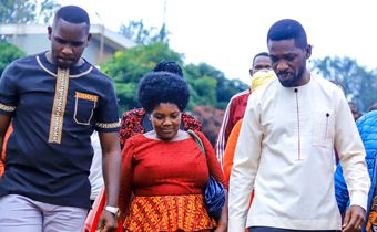Bobi Wine and LOP Joel Ssenyonyi with Eddy Mutwe's mother Jane Natumbwe at Masaka Central Prison