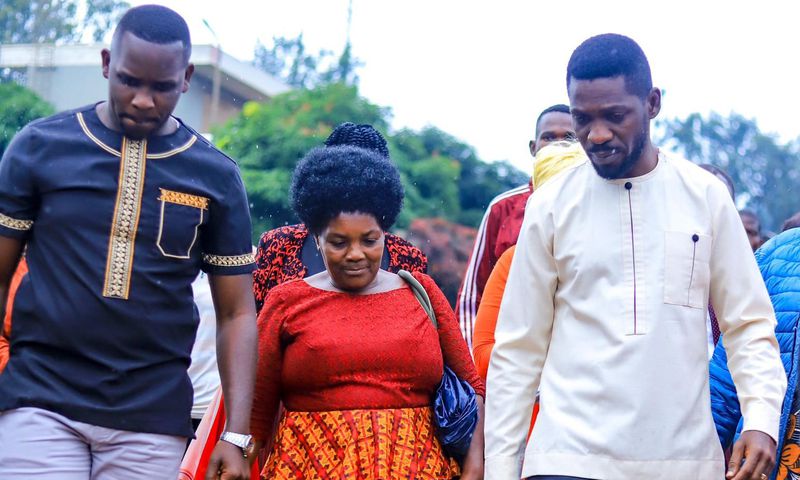 Bobi Wine and LOP Joel Ssenyonyi with Eddy Mutwe's mother Jane Natumbwe at Masaka Central Prison