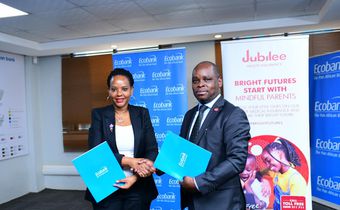Jubilee Health Insurance CEO, Dan Musiime with Grace Muliisa, Managing Director of Ecobank Uganda