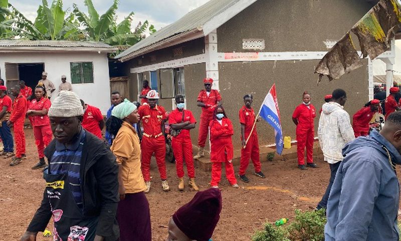 NUP security guards the house where Muhammad Ssegirinya's body was (Bukedde photo)