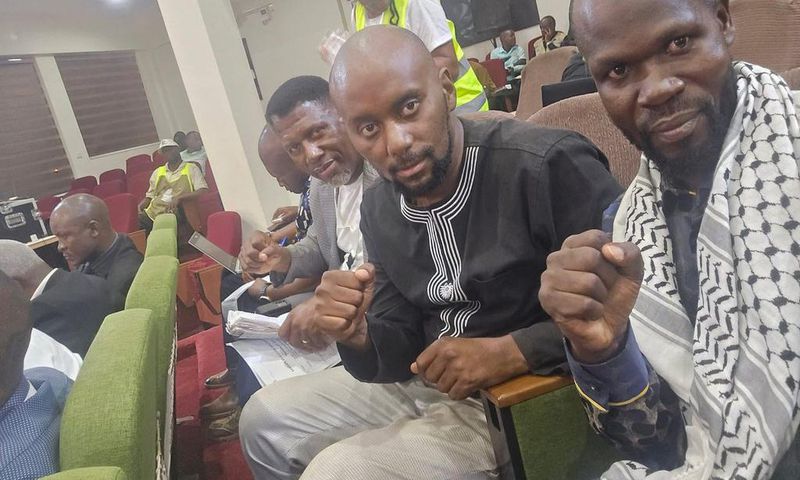 NUP candidate Luyimbazi Nalukola and party officials following the election results at Makerere University