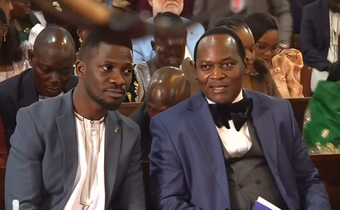 Bobi Wine chats with Mathias Mpuuga at Kabaka's birthday servce