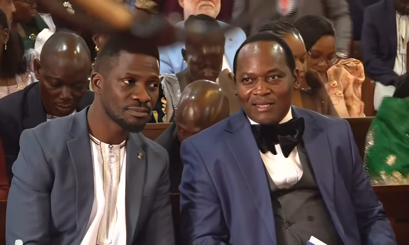 Bobi Wine chats with Mathias Mpuuga at Kabaka's birthday servce