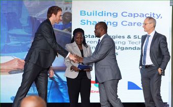 Valerian PFRIMMER, Managing Director for East and South Africa at SLB hands over the programme implementation agreement to Prof. Jude T. Lubega the Vice Chancellor of Nkumba University