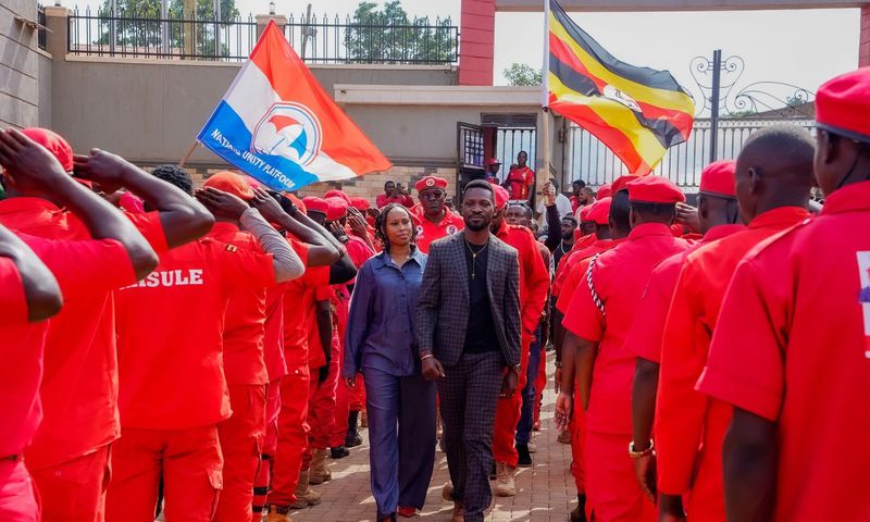 Bobi Wine touring a guard of honor