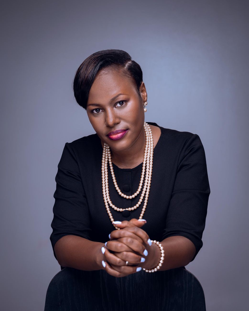 Charity Winnie Kamusiime Asiimwe, the UMS President