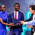 Namboozo and Muyita receiving their prize