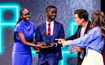 Namboozo and Muyita receiving their prize