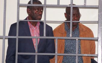 Dr Besigye and his co-accused in court