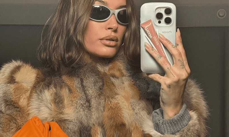 Hailey Bieber’s brand, Rhode, launched the original lip gloss phone case featuring a groove to hold a lip gloss.