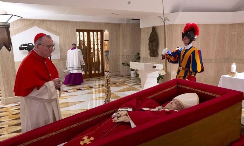 Pope Francis’ body in an open casket