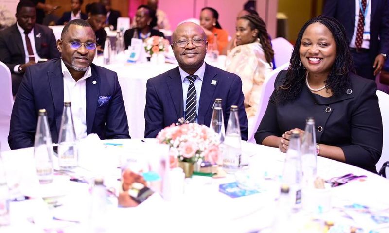 Head of Corporate and Investment Banking Hellen Luyima with customers at the Event