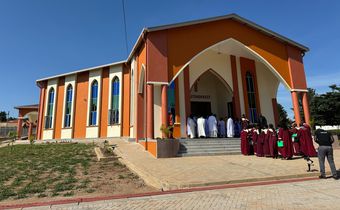 Sam Kutesa built a new church after recovering from cancer