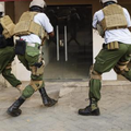 Kenyan security team advance to take on terrorists and rescue civilians in Dusit.