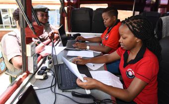 KRA staff working on their desks