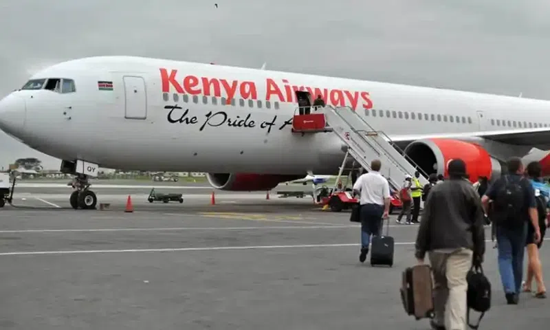 Passengers boarding a Kenya Airways flight