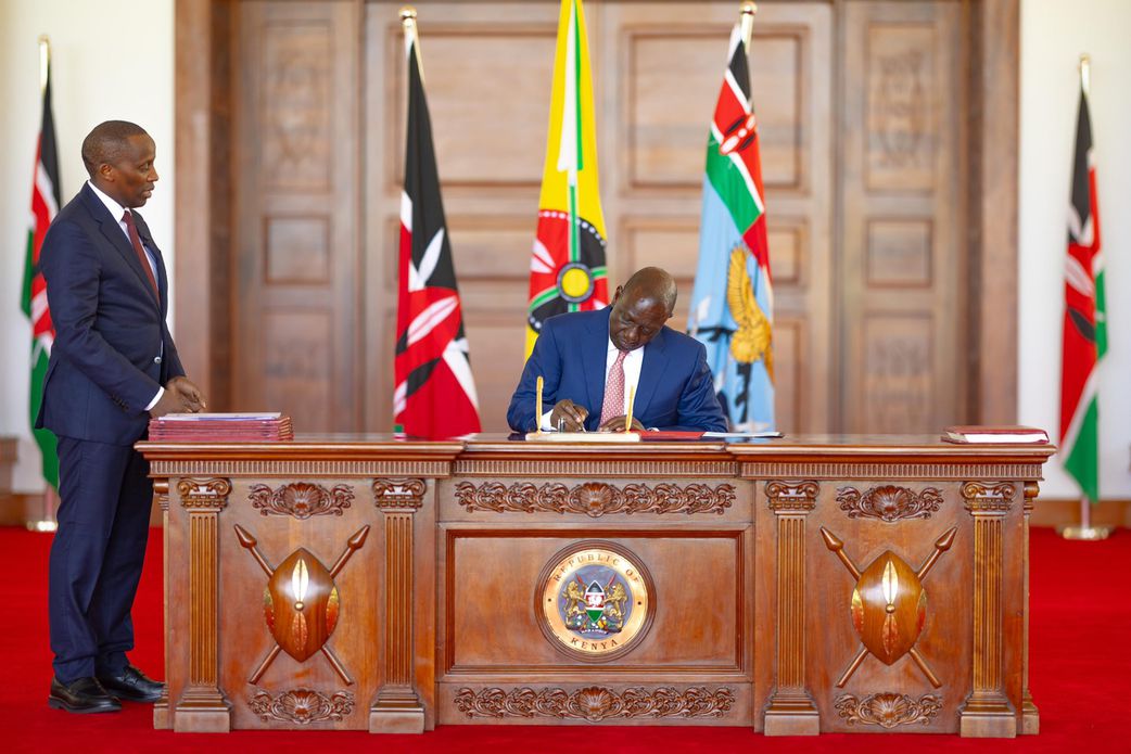 President William Ruto signing a bill into law