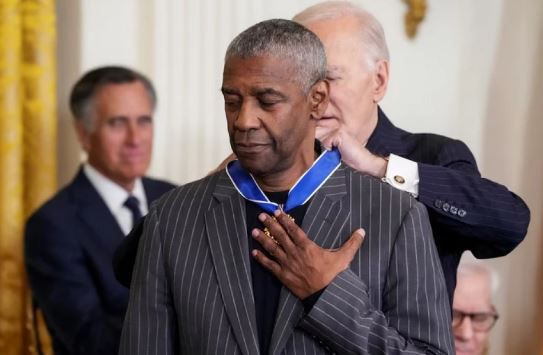 U.S. President Joe Biden presents the Presidential Medal of Freedom to Actor Denzel Washington