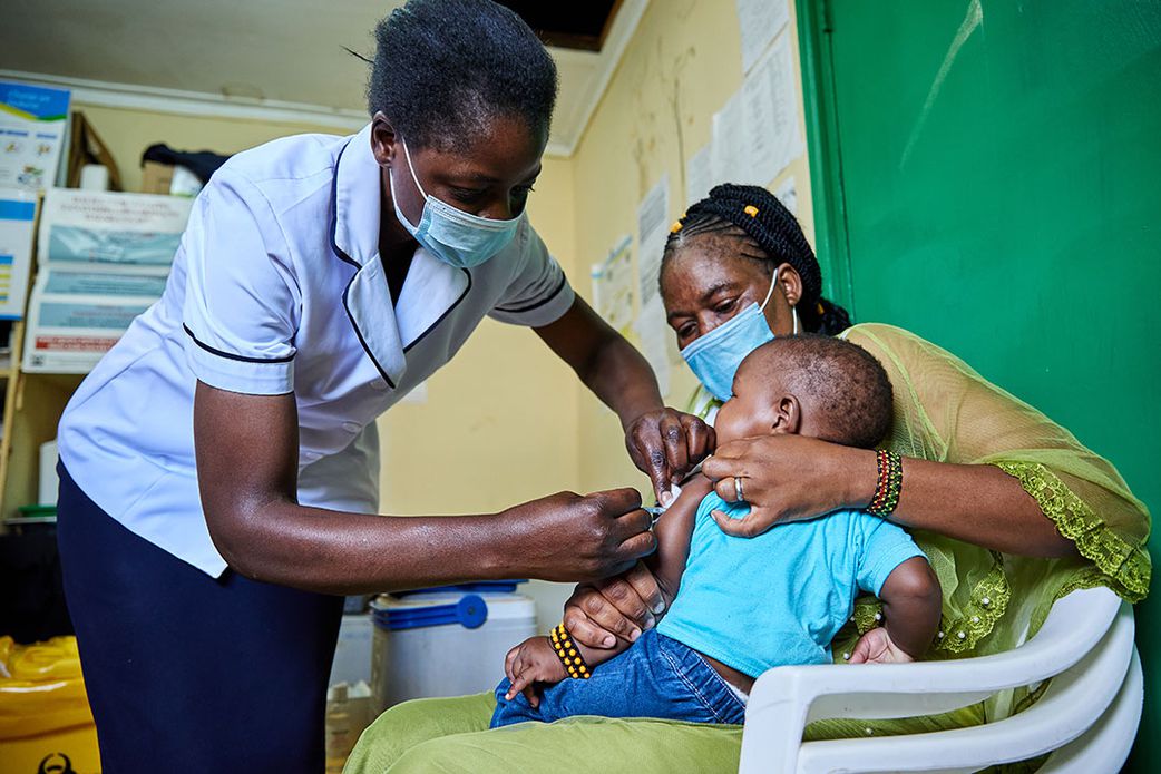 A nurse administering a vaccine