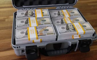 A briefcase with dollars