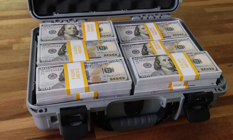 A briefcase with dollars
