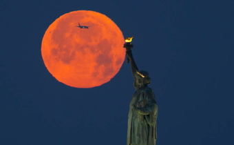A file image of the full Strawberry Moon that was visible last year on June 4 gracing the sky as seen from New York (Courtesy)