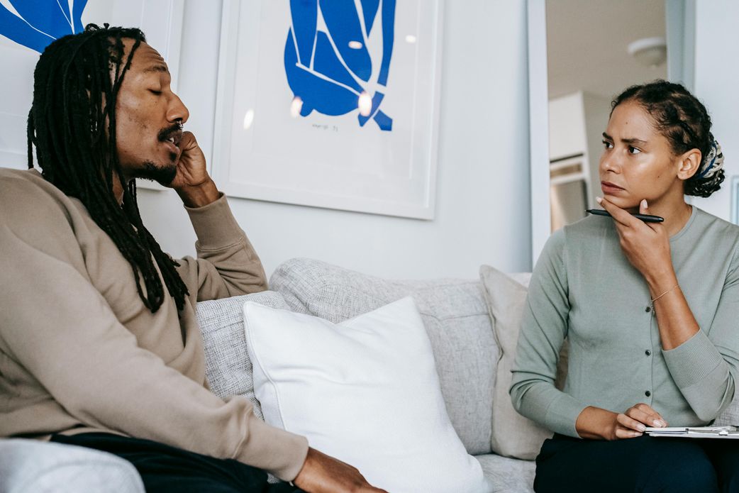 A man speaking to a therapist