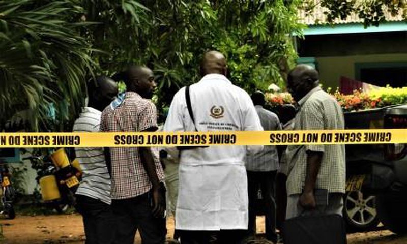 File image of DCI officers at a crime scene
