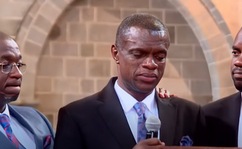 The late Edward Kwach's brother Edgar Kwach breaks down during his memorial service