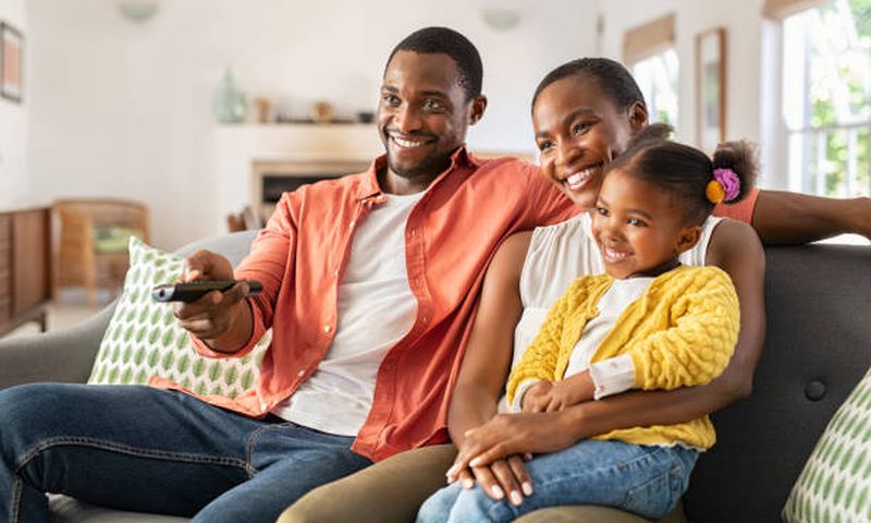 A family watching tv