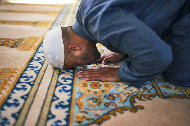 A muslim faithful praying